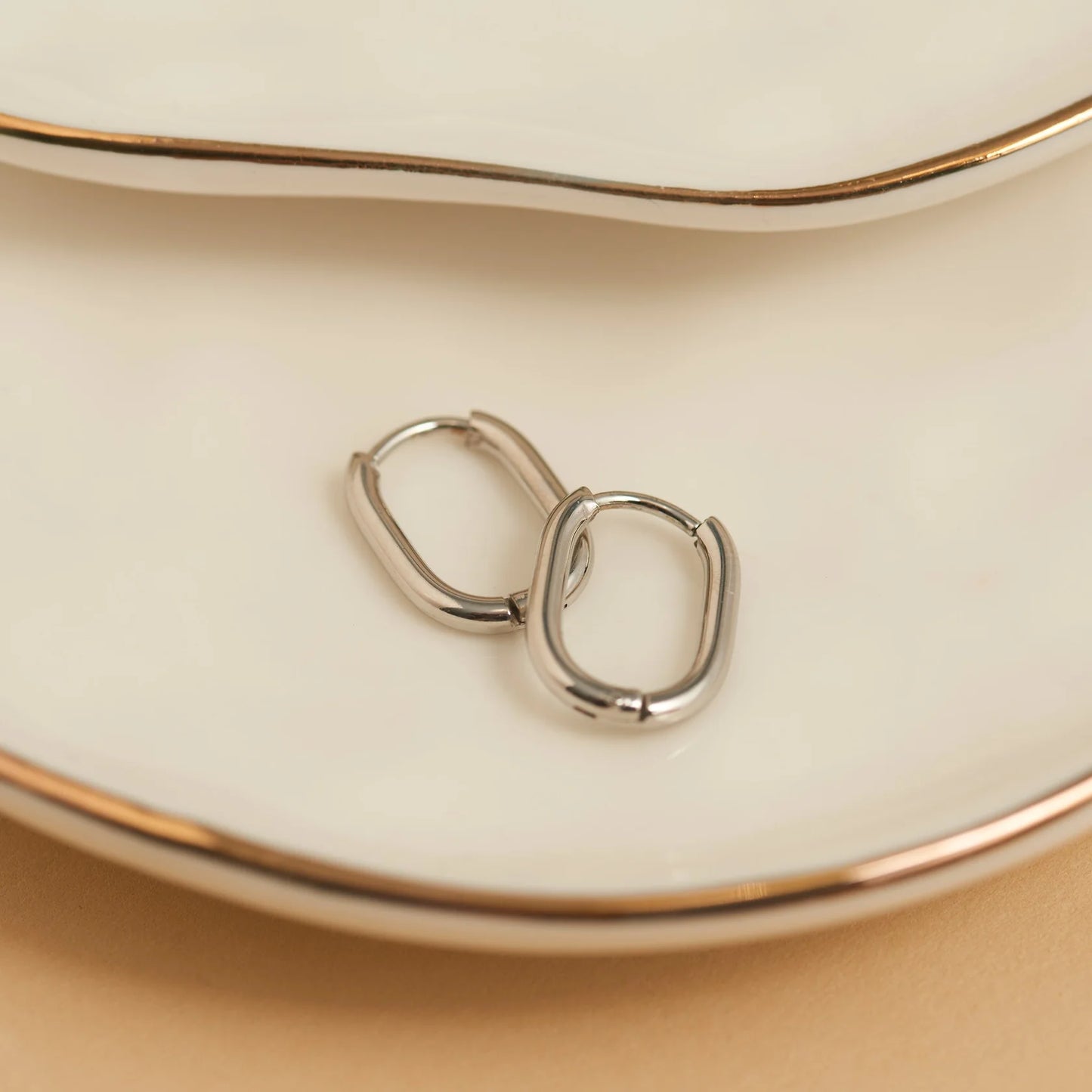 Oval Huggie Silver Hoop