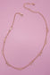 CUTOUT BOW STATION NECKLACE