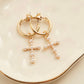 Cera Gold Pearl Cross Earrings