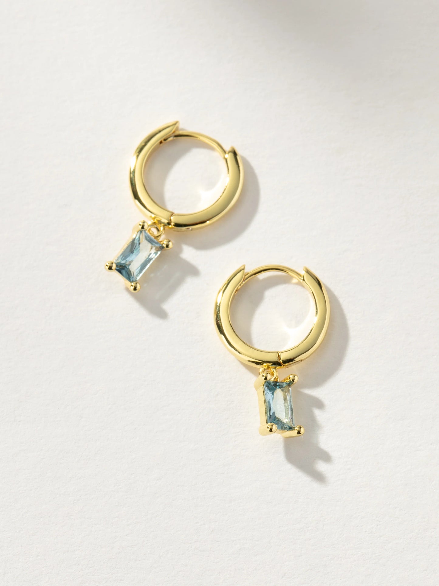 Skosh + Gold Baguette Birthstone Huggy Hoop Earring Collection