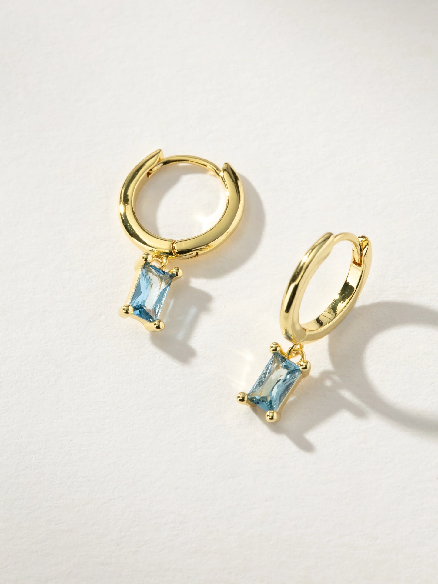 Skosh + Gold Baguette Birthstone Huggy Hoop Earring Collection