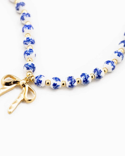 Blue Bead Bow Pendant Necklace