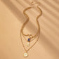 LAYER CELESTIAL CROSS BLUE STONE CHARM NECKLACE | GOLD