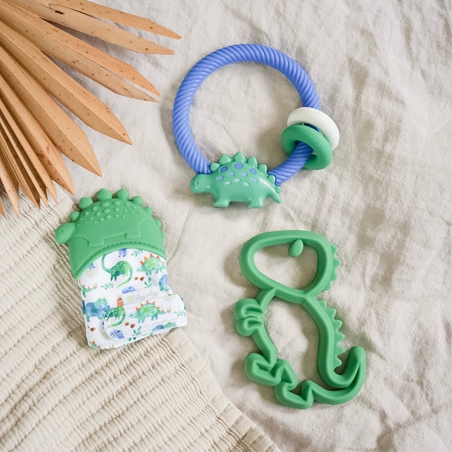 Itzy Mitt™ Silicone Teething Mitts: Dinosaur
