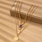 LAYER CELESTIAL CROSS BLUE STONE CHARM NECKLACE | GOLD