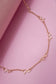 CUTOUT BOW STATION NECKLACE